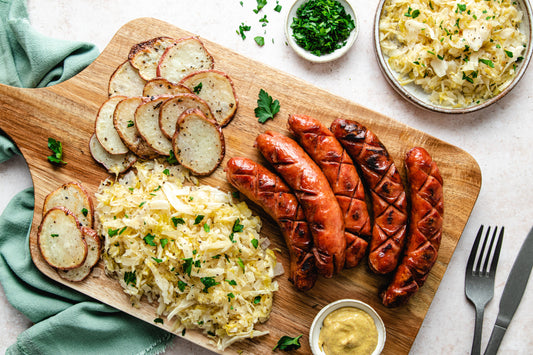 Bratwurst and Kraut served with roasted potatoes